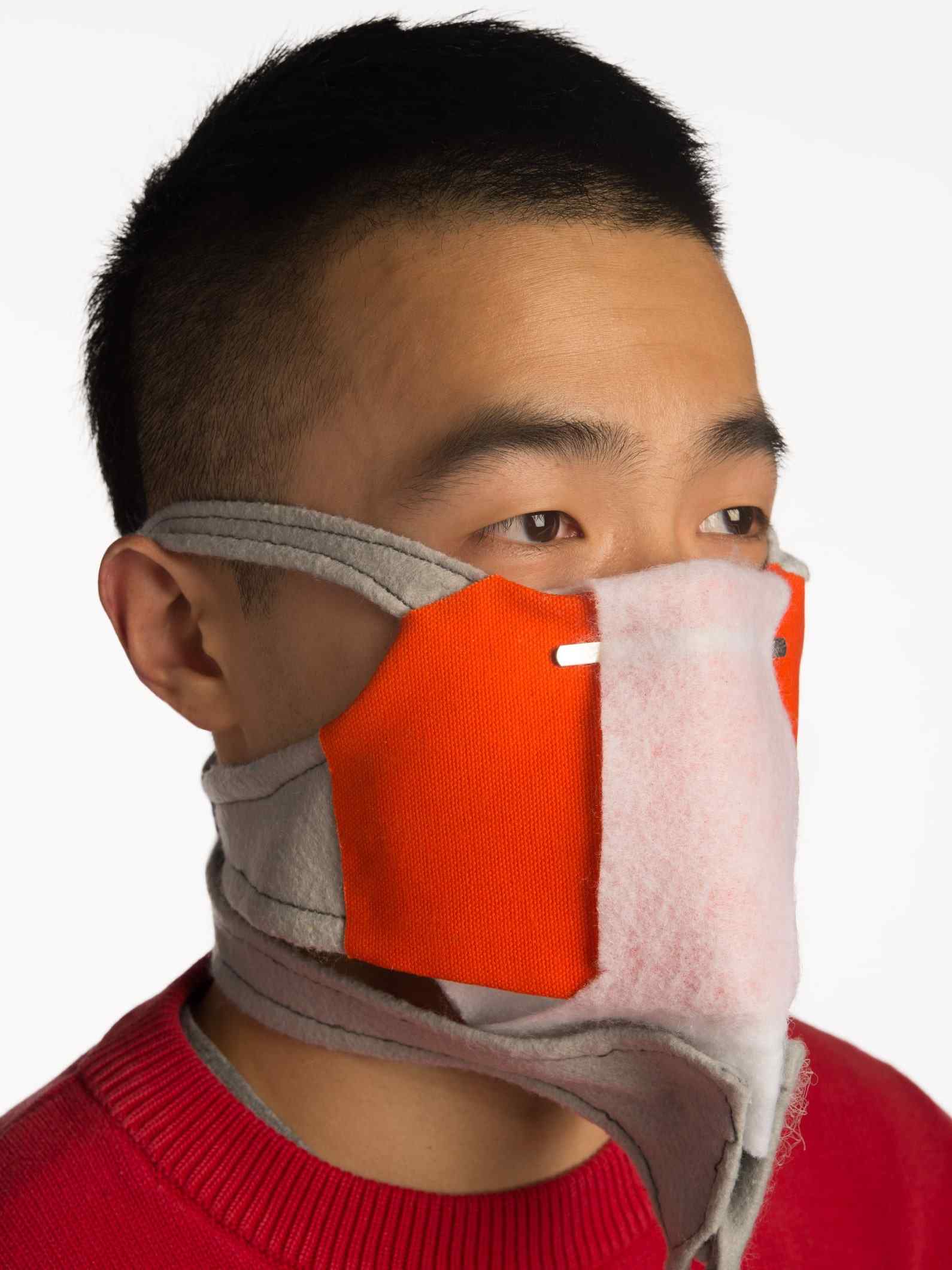 product photoshoot showing a person wearing an alternative fabric based respirator